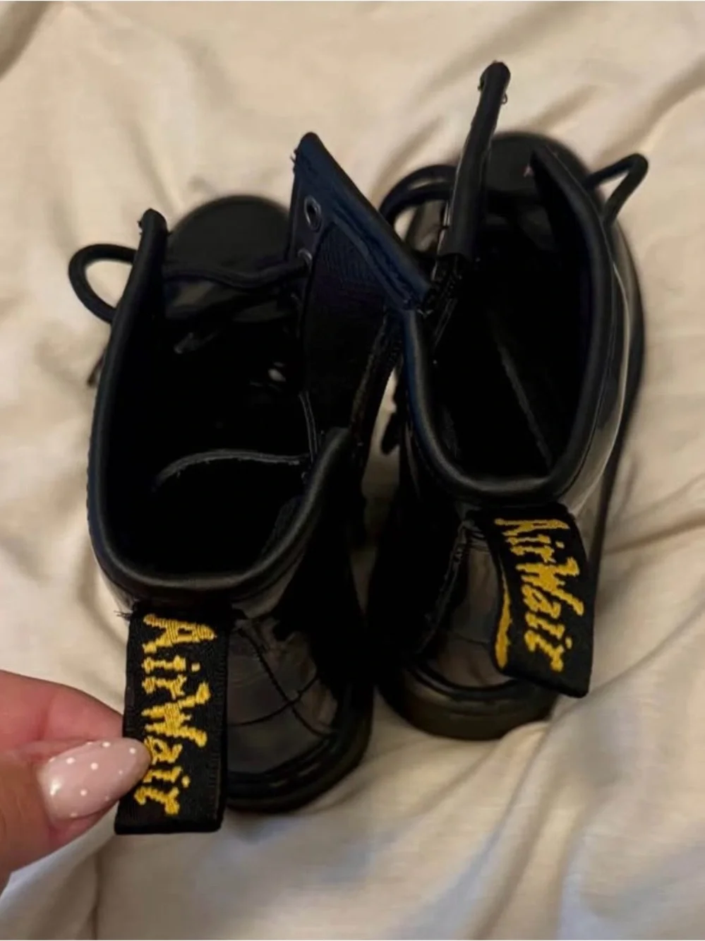 Dr. Martens Kids Black Patent Lace-Up Boots with Yellow Stitching